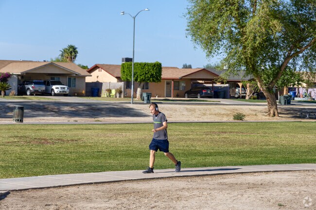 Las Casitas Park provides a serene environment for walking, playing, and relaxing in the heart of Yuma.