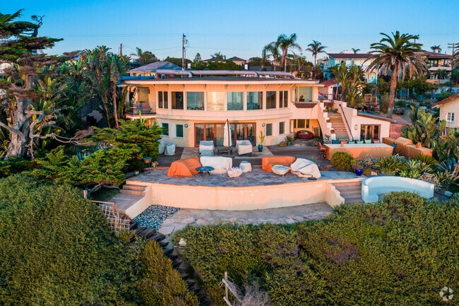 There are large modern custom homes along the stunning cliffs in Leucadia.
