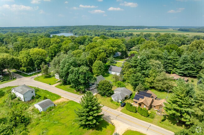 Homes in Grand Detour sit close together, reinforcing the community’s small-town character.