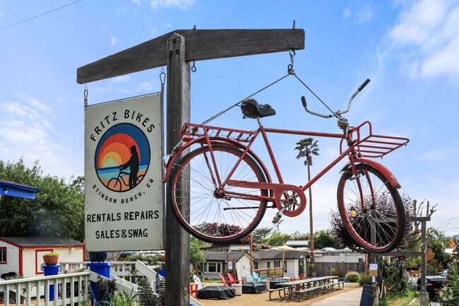 A bicycle hanging from a post Stinson Beach's downtown area.