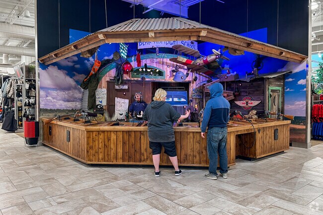 Enjoy some arcade games near Meadowlark at Scheels.