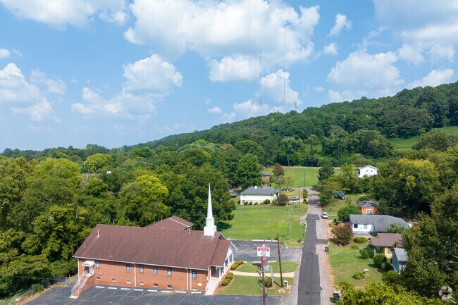 Homes in Tarpley City offer Red Mountain views and wooded scenery.