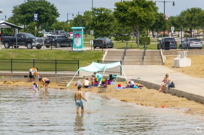 Swimming at Sunset Pointe lakefront in Little Elm is a summer favorite.