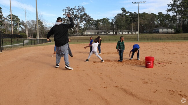 Kids practice baseball basics at TS Martin Park near Greenview in Columbia.