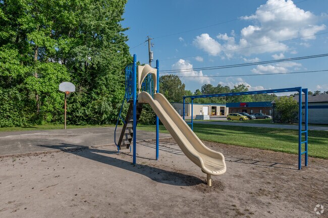 Students can play on the slide at Indian Creek Welcome Baptist Church School in Greenbrier East.