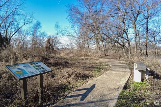 Take a stroll along the walking trails at Kingman Lake in Langston on a sunny day.