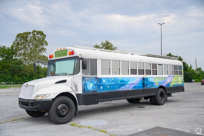 The 'This Poets Journey' bus in Hyde Park is a touring art gallery.