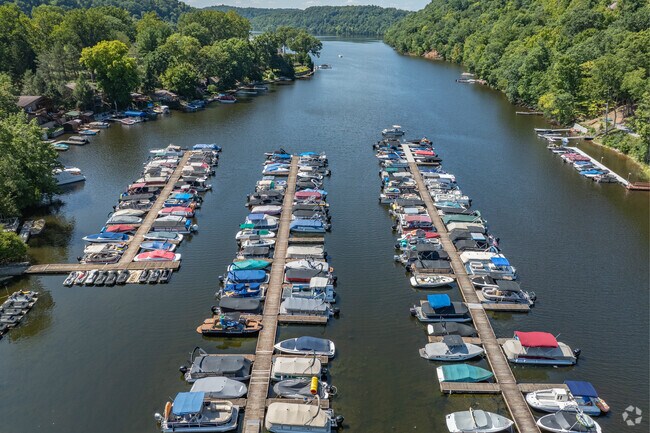 Boats are docked in Cheat Lake waiting for their chance to spend a day in the sun on Cheat Lake.