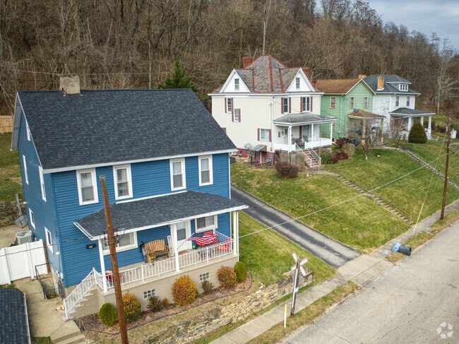 This home along the river is colorfully painted, like many homes in West Brownsville.