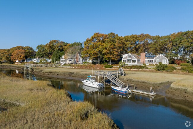 Rows of waterfront homes line the shores of Marshfield Hills.