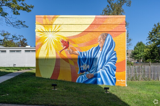A mural in Catholic University depicting a woman with a cardinal.