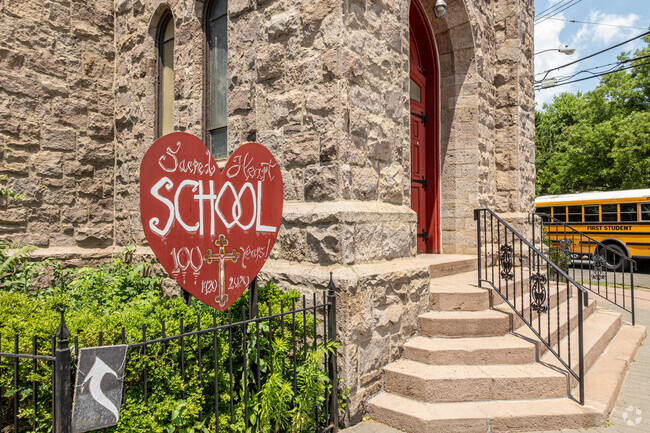 Sacred Heart School's heart-shaped sign is a welcoming sight to visitors to Camden.