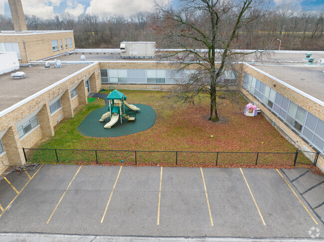 Students enjoy playing outside on the playground for recess.
