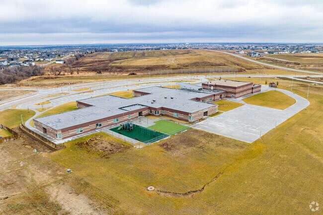 Ashbury Elementary School is located near a new housing development.