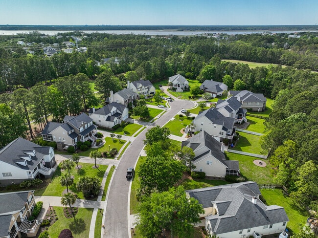 Tree-lined streets in Park West create a charming, small-town community feel.