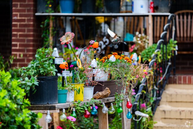 Gwynns Falls showcases neighbor‑made art and personal touches on porches.