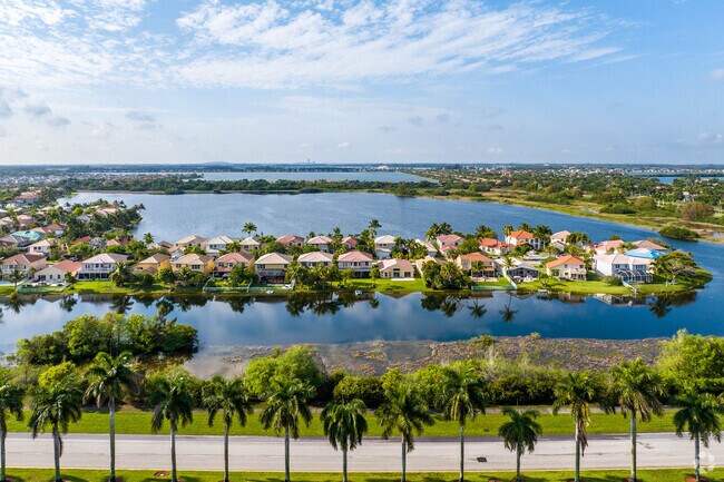 Find a home on a peninsula in Sunset Lakes.