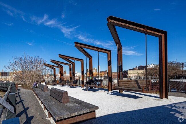 The Rail Park features swings built from repurposed factory materials.