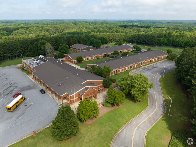 Arbor Springs Elementary School has a large campus with green landscapes.