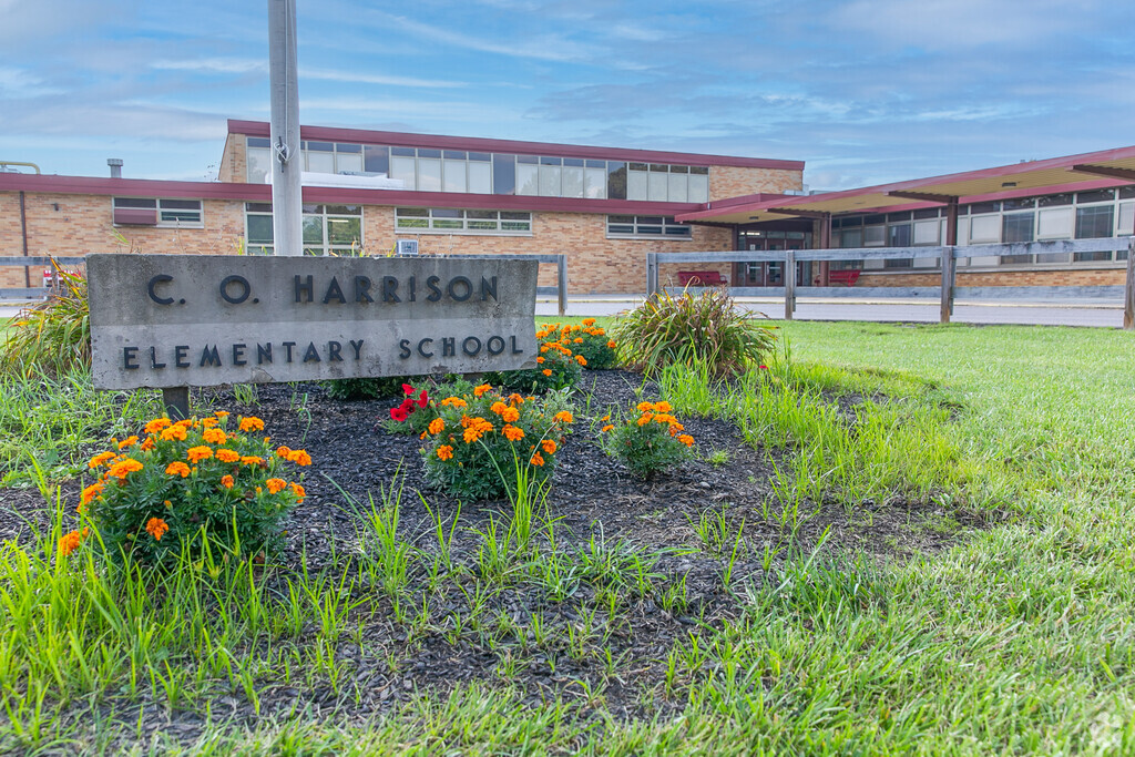 Signage and front entrance of school.