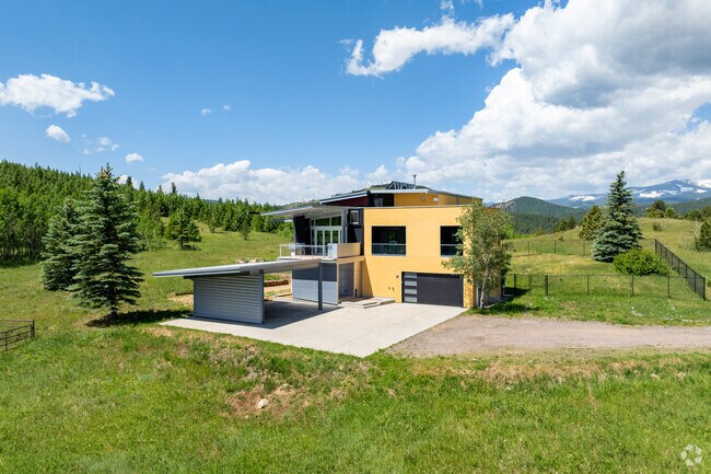 Modern prairie-style homes with attached horse barns provide an incredible backdrop.