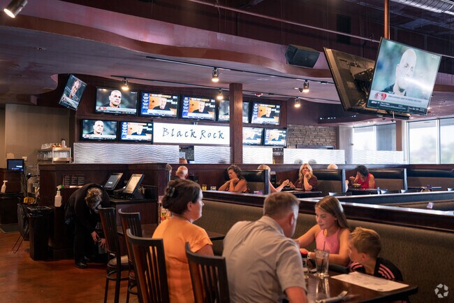 Black Rock Bar & Grill draws Hartland locals with its sizzling steaks and lively vibe.