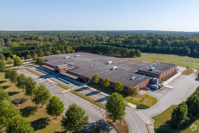 Mulberry Elementary School has a large playground behind the school building for all students.