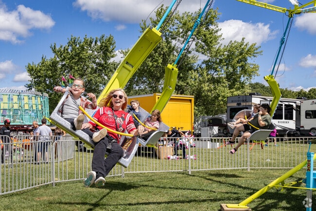 Families enjoy the rides at the Labor United Celebration in Allegheny Township.