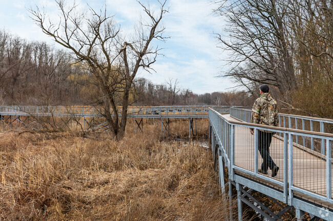 The elevated walk way through Middle River Park offers College Hill residents a natural respite.