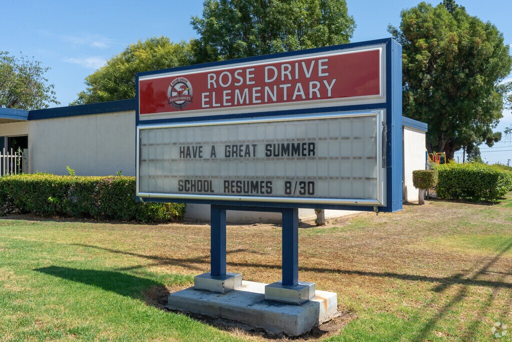 School signage displays school news and updates.