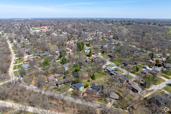 Homes in Waveland Woods sit quietly among mature trees and well-kept residential streets.