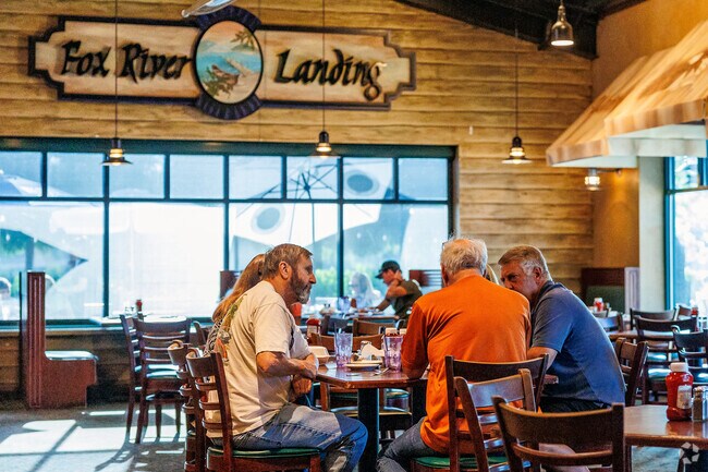 Old Third Ward residents gather for a meal at Pullman's at Trolley Square.