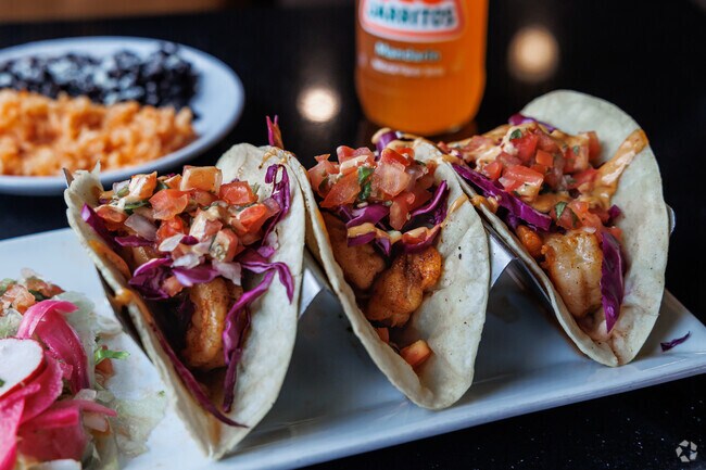 Mouth watering shrimp tacos with all the fixings at Carlos & Harley’s Fresh-Mex is a local favor