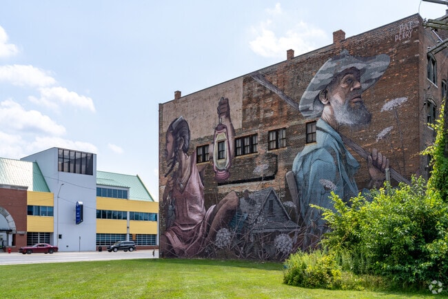 Large format murals designed by local artists are found all around McDougall-Hunt.