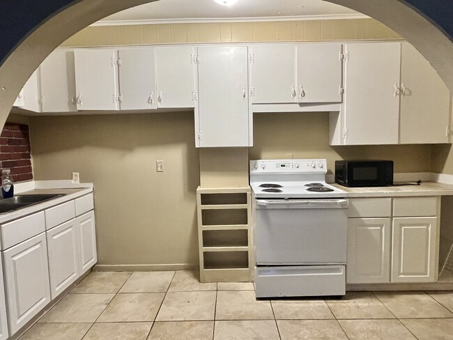 Newly painted kitchen & cabinets. Microwave, stove/oven are included