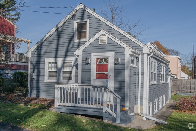 On a quiet side street of the Coury Heights neighborhood, a quaint cape stands proud of a hill.
