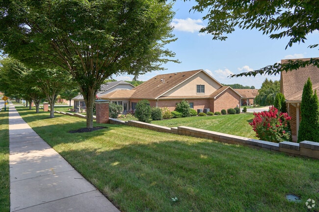 Single-level brick ranches add easy living throughout Paramount-Long Meadow.