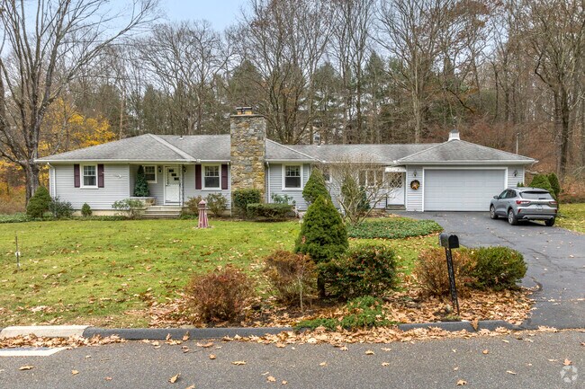 An upgraded ranch-style home on Cedar Hill Drive in Tashua featuring new siding.