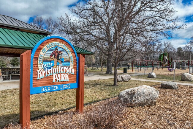 Baxter's  Oscar Kristofferson Park is fun for the whole family with an expansive playground and multiple baseball fields.