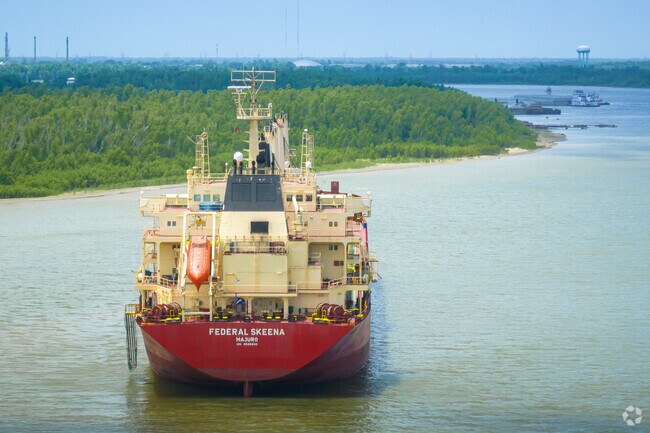 New Aurora residents can watch as shipping vessels move cargo along the Mississippi River.