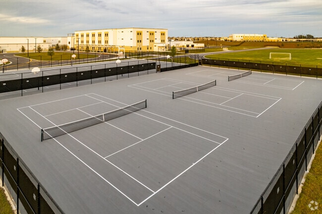 Students love to play tennis on the courts at Water Spring Middle School in Orange County.