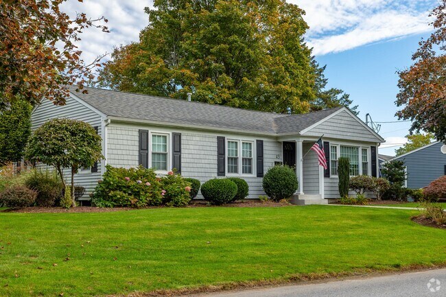 Craftsman ranch style homes in Budlong sit on manicured front lawns set back from the street.