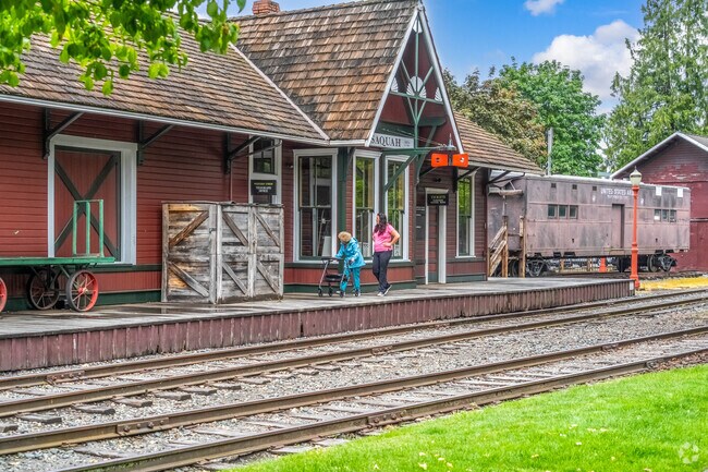 Gilman residents enjoying a morning walk at the Issaquah Depot Museum.