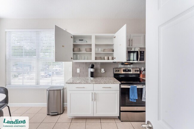 2801 Biltmore Park Dr unit 2-107, Orlando, FL 32835 - photo 5