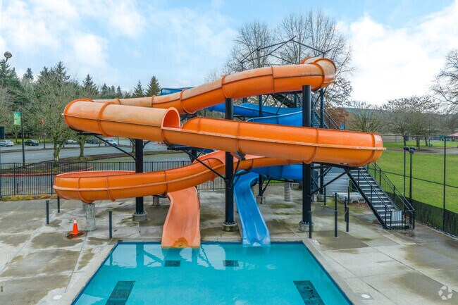 Henry Moses Aquatic Center near Talbot features pools and slides.