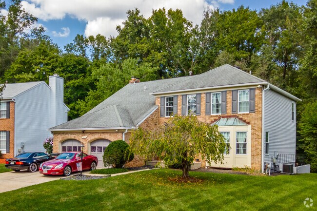 Many of the homes in Lake Arbor have multi-car driveways and attached garages.