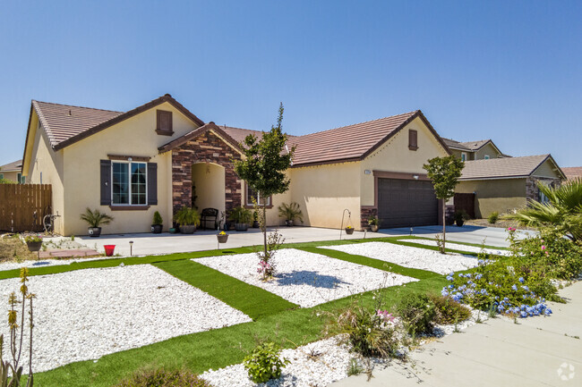 A home with a custom landscape in Wildflower.