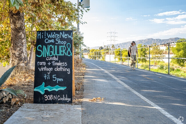 The LA River flows through Elysian Valley, inspiring art and recreation.