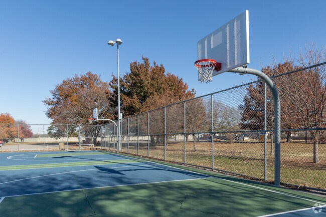 Shoot some hoops on the re-surfaced basketball court at Clark Park in Western Village