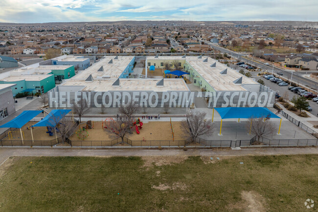 Large sign of school name at Helen Cordero Primary School.
